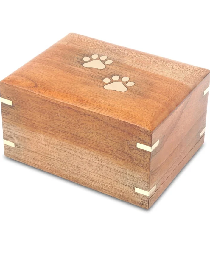 Wooden pet cremation box with paw print detail
